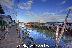 "Blue houses city", in the coast of Sandakan, Sabah, Borneo. by Miguel Cortés 